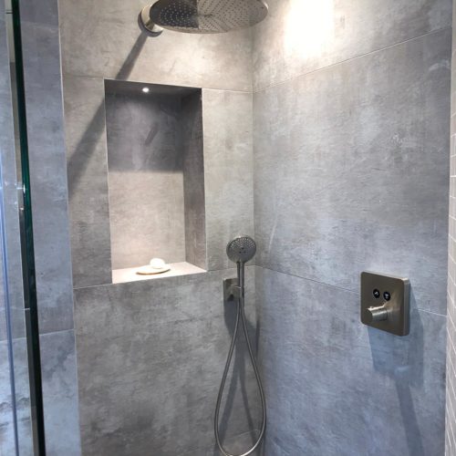 High End Wetroom and Mosaic feature on a Curved Wall