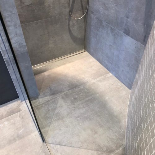 High End Wetroom and Mosaic feature on a Curved Wall