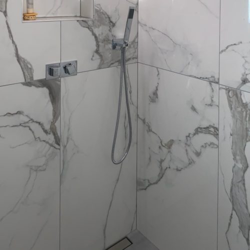 Marble Wetroom with Raised Shower Area