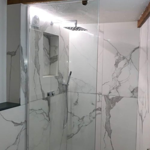 Marble Wetroom with Raised Shower Area
