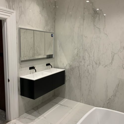 Stunning Marble Wetroom with His and Hers Showers