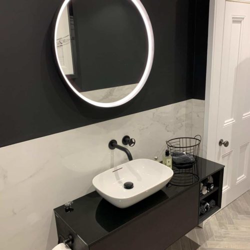 Large Cloakroom with Black Brassware