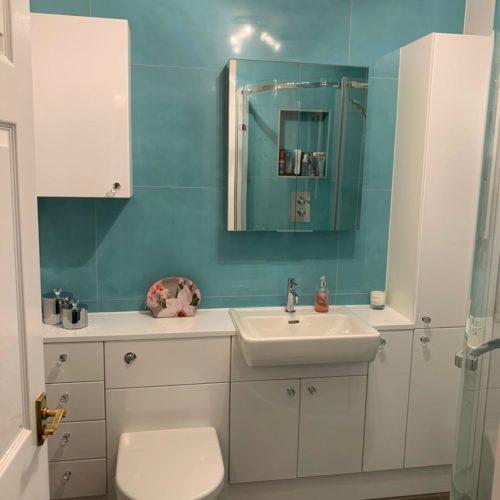 Turquoise Feature Tile with Walk in Shower