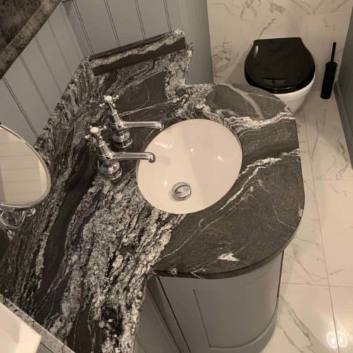 Traditional Bathroom with Black and White Marble