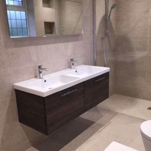Beige Wetroom with Subtle Feature Tile