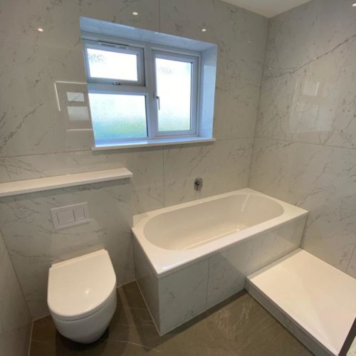 Large Family Bathroom with Walk in Shower and Built in Bath