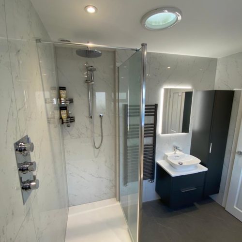 Large Family Bathroom with Walk in Shower and Built in Bath